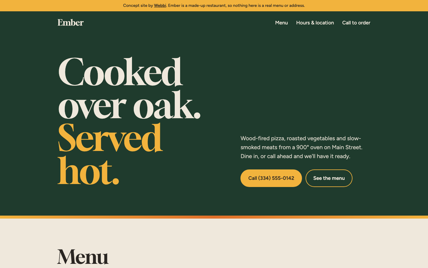 Ember restaurant website homepage with a large 'Cooked over oak. Served hot.' headline